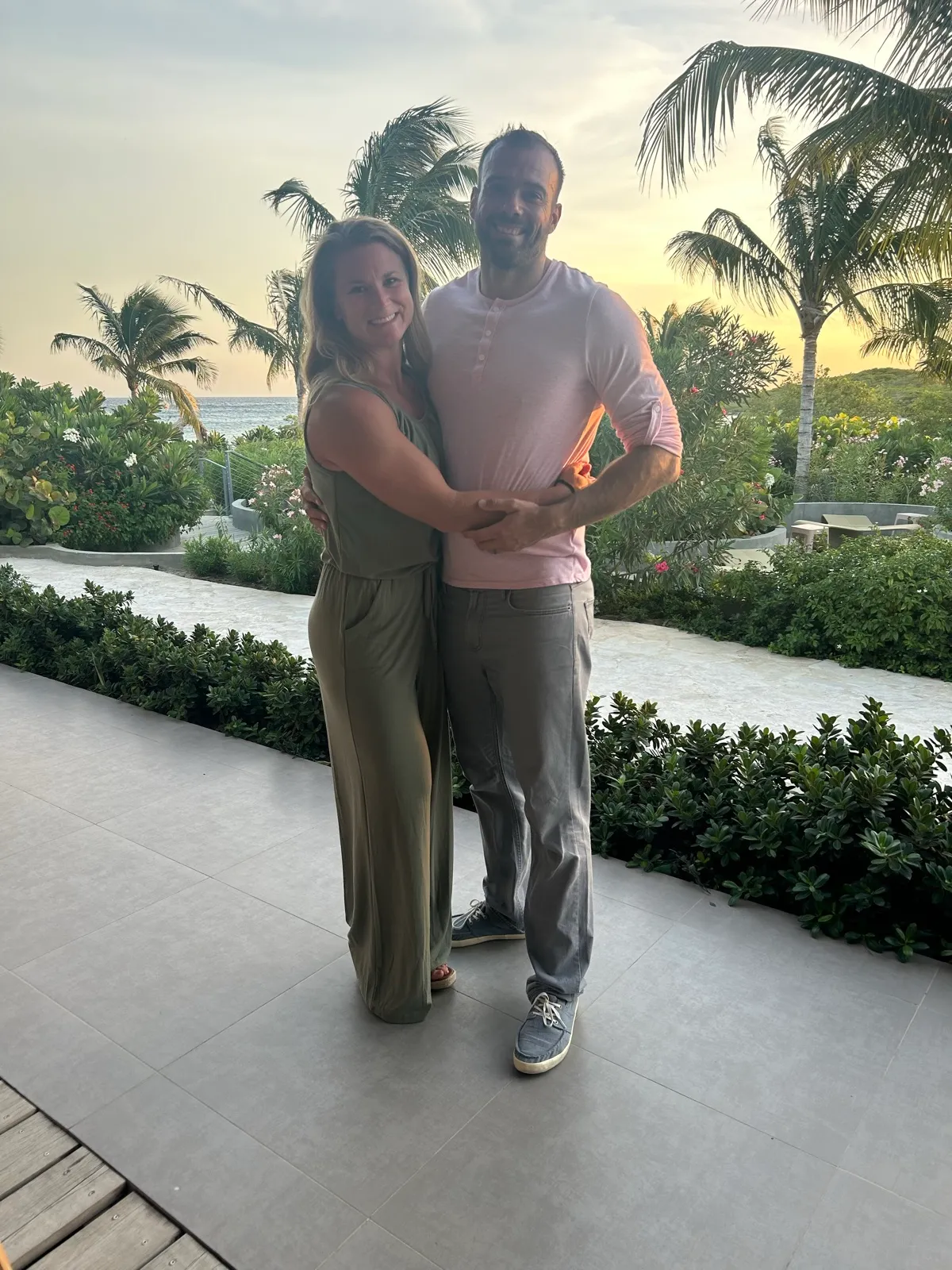 A couple relaxing together at an all-inclusive beach resort