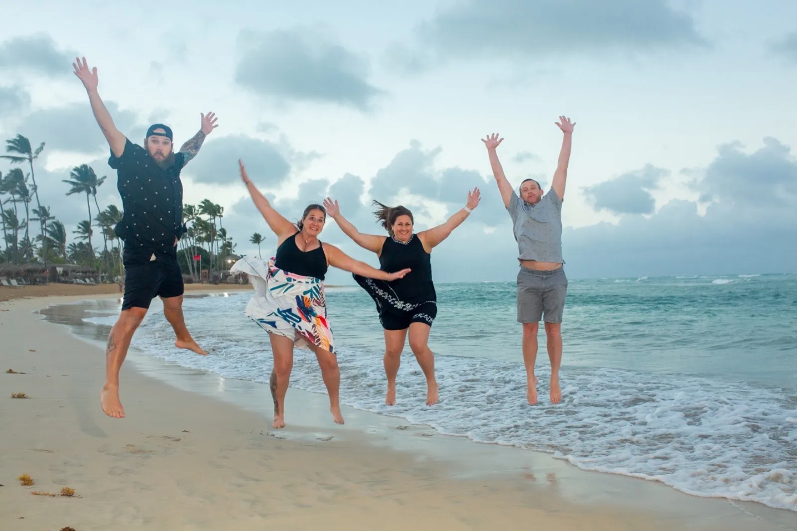 A group of friends celebrating together at a resort